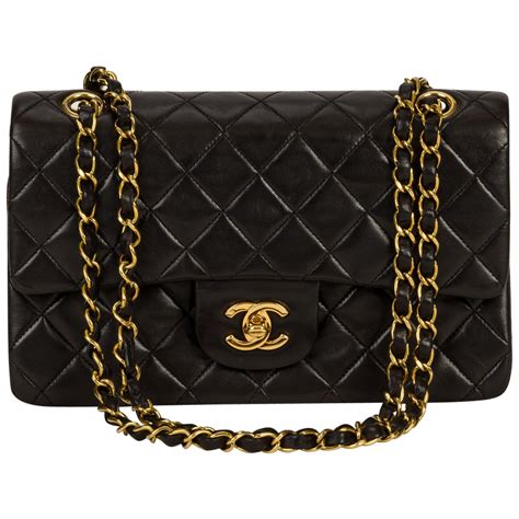 chanel bag black and gold|black chanel bag gold chain.